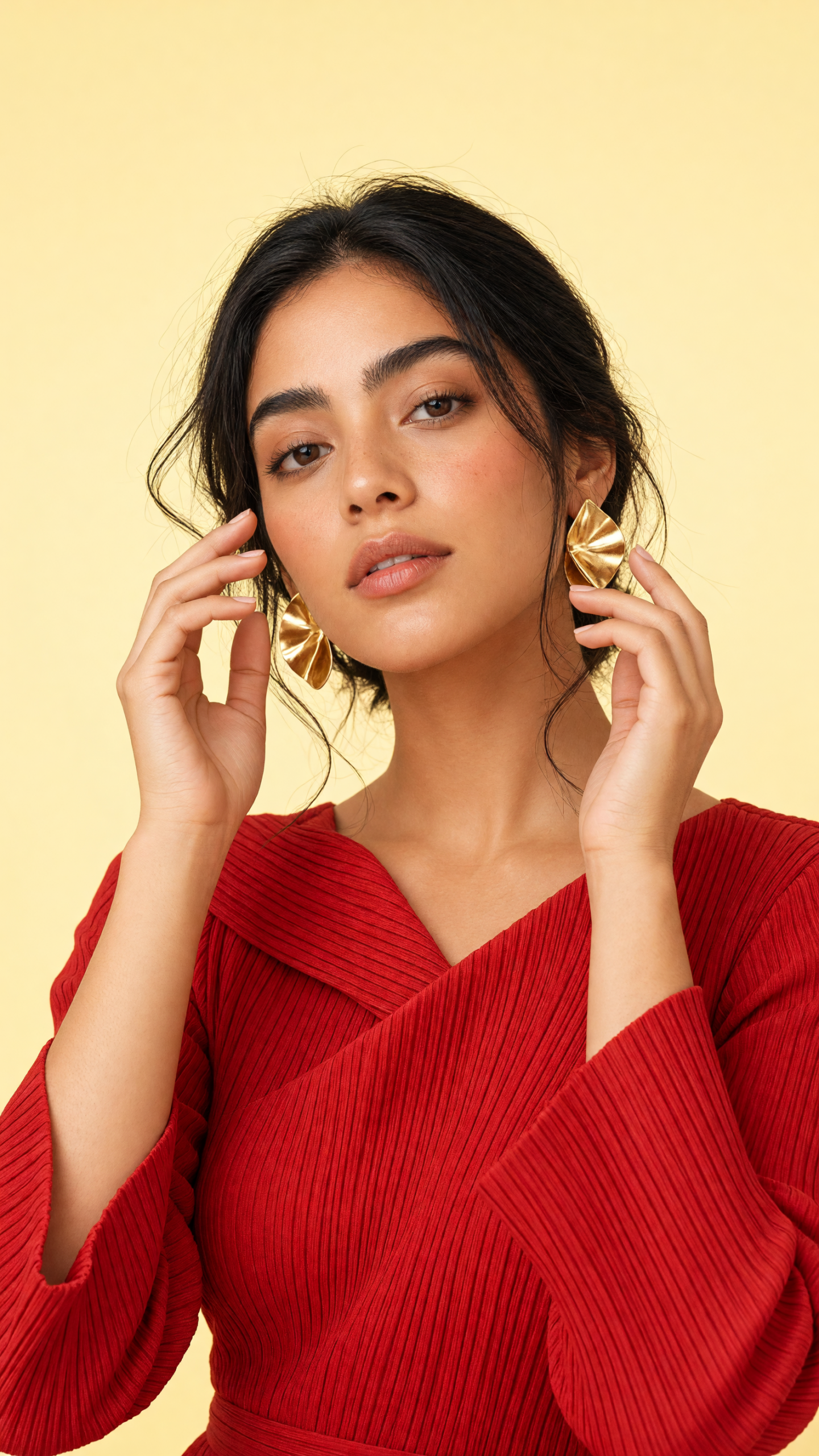 High-key editorial portrait in a yellow studio